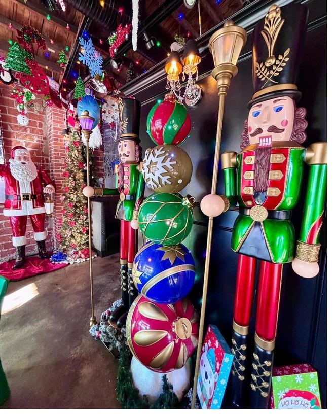 Towering nutcrackers and oversized ornaments standing guard