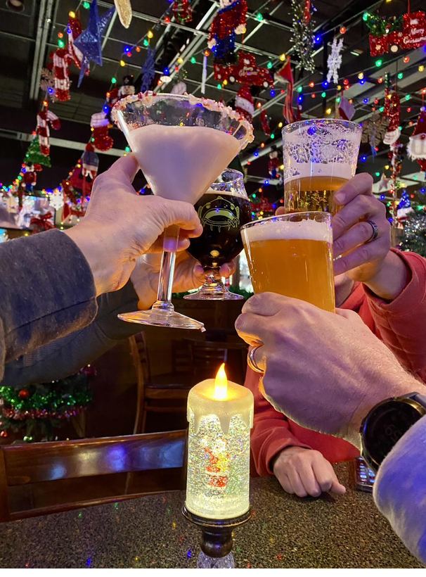 A toast with seasonal cocktails and a frosty beer